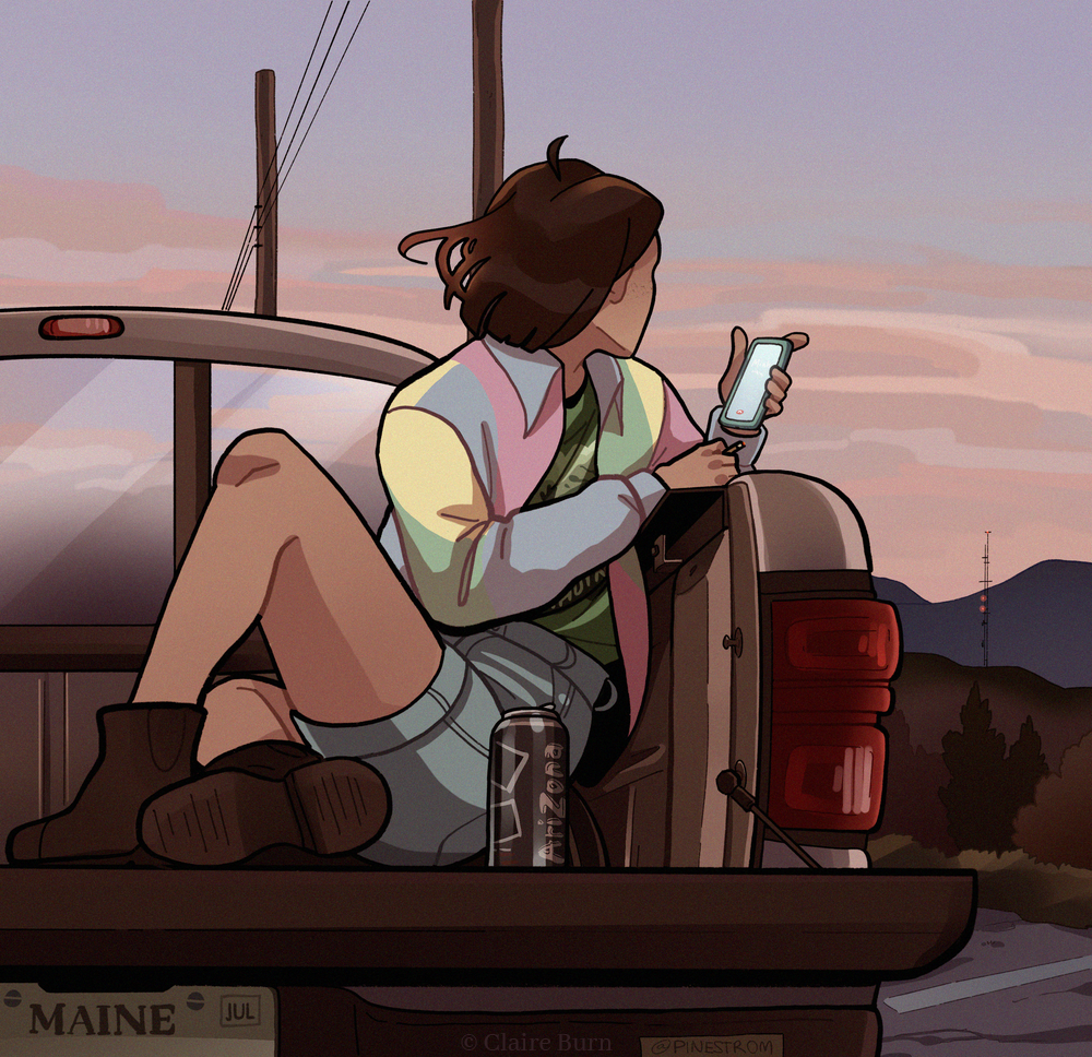 A person sits in the back of a pickup truck, holding their phone in one hand and a cigarette in the other, looking away from the viewer towards a pink sunset.